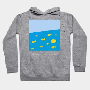 A school of yellow fish swimming in the blue sea Hoodie